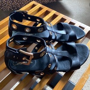 Cole Haan black leather with gold grommets Gladiator Sandals